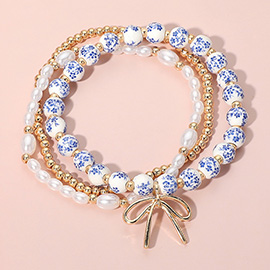 3PCS - Metal Bow Charm Pointed Ceramic Ball Pearl Beaded Stretch Multi Layered Bracelets